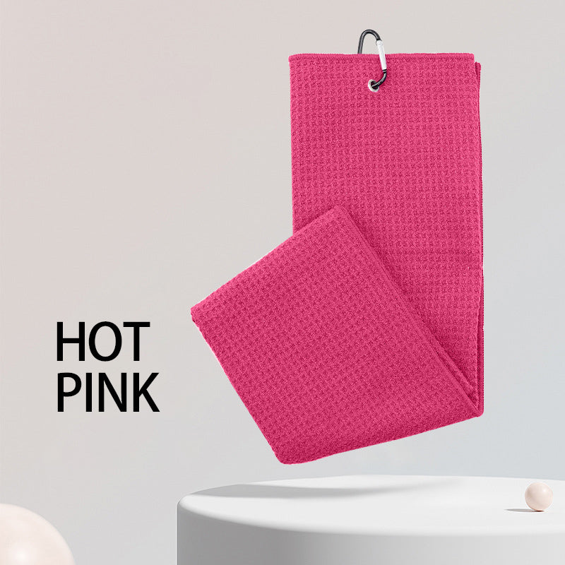 Hot pink sports microfiber waffle towel with custom embroidered logo and golf club clip